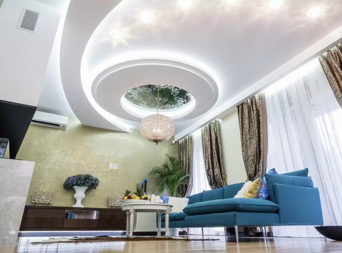 Mẫu trần thạch cao hình elip thiết kế cách điệu cao thấp và hài hòa